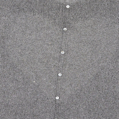 Brand and care label for Next women’s silver jumper, size UK 10