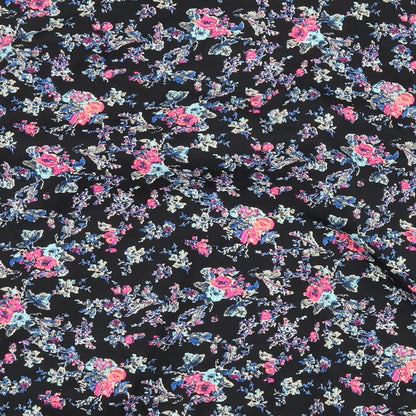Brand and care label for New Look girls’ black floral jacket, size S