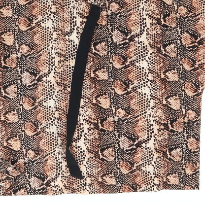 Brand and care label for Primark women’s brown animal print basic blouse, size UK 10