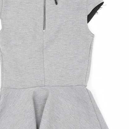 Brand and care label for H&M women’s grey basic t-shirt, size UK 4