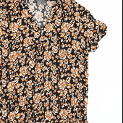 Close-up detail of Papaya women’s black floral a-line, size UK 10