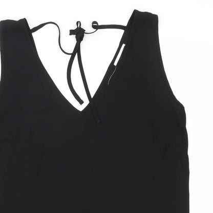 Close-up detail of Preworn women’s black basic blouse, size UK 12