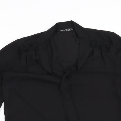 Close-up detail of Atmosphere women’s black basic blouse, size UK 8