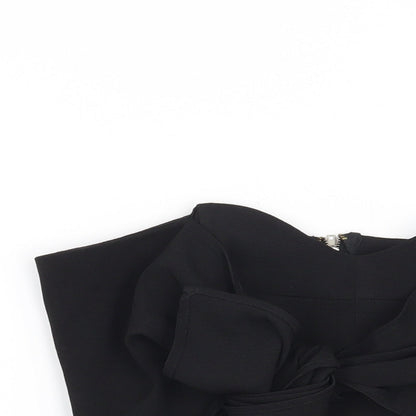 Close-up detail of Preworn women’s black basic blouse, size UK 10