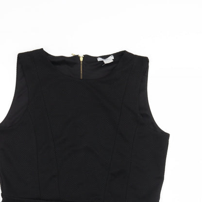 Close-up detail of H&M women’s black basic blouse, size L