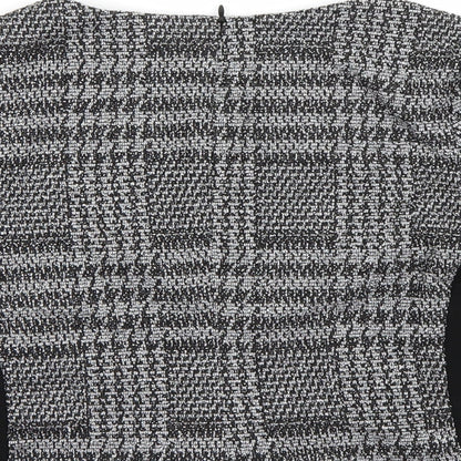 Brand and care label for Eliane Rose women’s black check basic blouse, size S