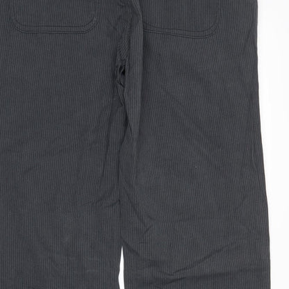 Brand and care label for Next men’s grey striped trousers, size 32, in