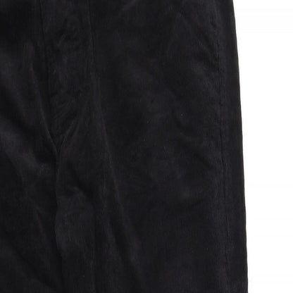 Close-up detail of Tu women’s black trousers, size M, 32-inch leg