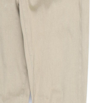 Close-up detail of pre worn women’s beige trousers, size M, 34-inch leg