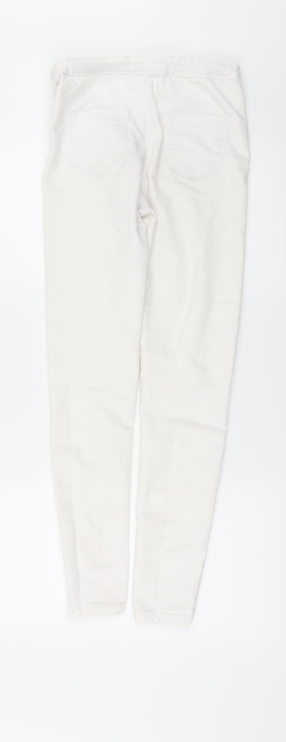 Back view of Candy Couture girls’ white denim skinny jeans, size 13, years