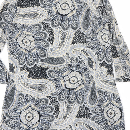 Brand and care label for Atmosphere women’s black floral a-line, size UK 14