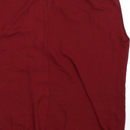 Brand and care label for Arcadia women’s brown basic blouse, size UK 18
