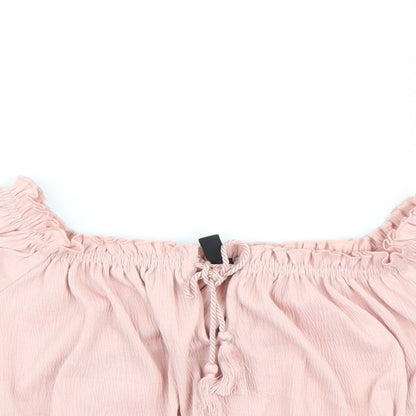 Close-up detail of Divided by H&M women’s pink cropped tank, size S