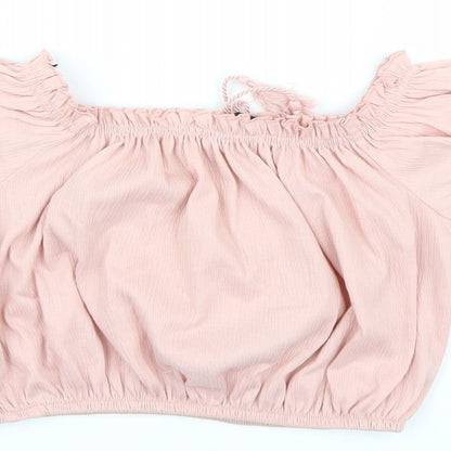 Brand and care label for Divided by H&M women’s pink cropped tank, size S