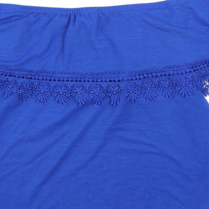Brand and care label for Peacocks women’s blue basic blouse, size UK 8