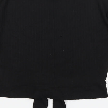 Brand and care label for F&F women’s black jumper, size UK 6
