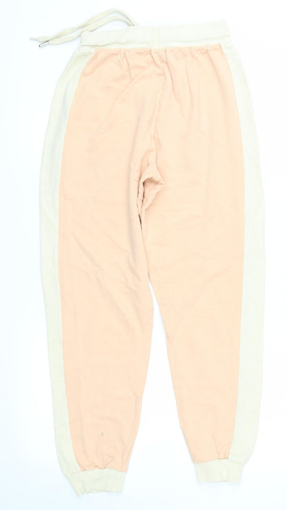 Back view of ASOS women’s pink sweatpants, size UK 6