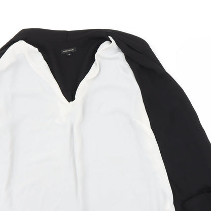 Close-up detail of River Island women’s white basic blouse, size UK 10