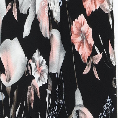 Close-up detail of Pink Boutique women’s black trousers, size UK 10, 27-inch leg