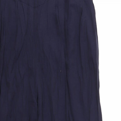 Close-up detail of Preworn women’s blue trousers, size L, 29-inch leg