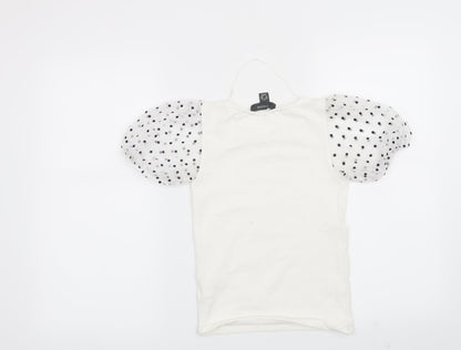 Back view of Primark women’s white polka dot basic blouse, size UK 4