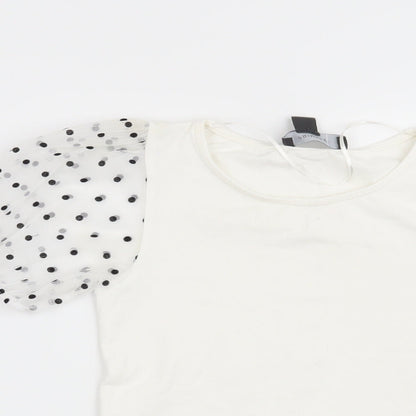 Close-up detail of Primark women’s white polka dot basic blouse, size UK 4