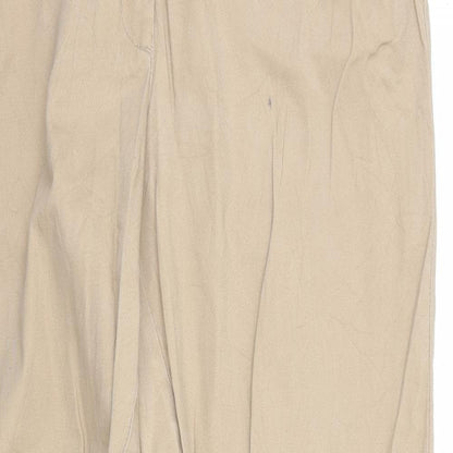 Close-up detail of Preworn women’s brown chino trousers, size UK 36, in, 30-inch leg