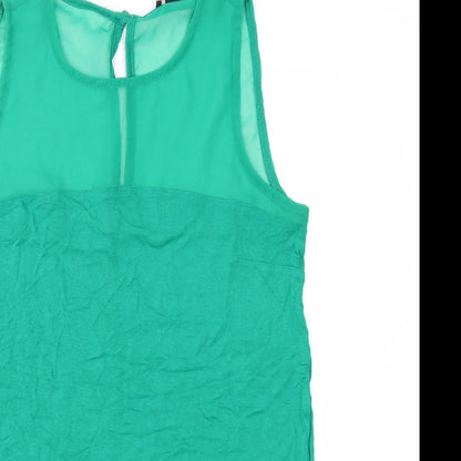 Close-up detail of H&M women’s green basic blouse, size S