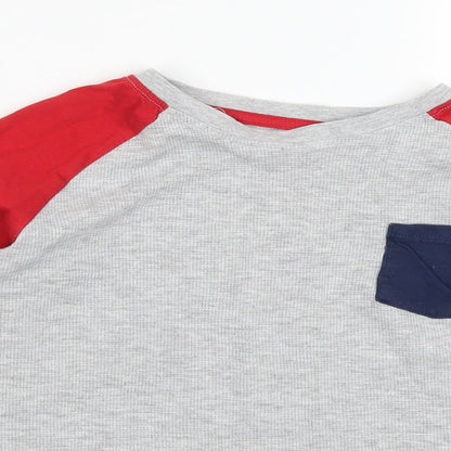 Close-up detail of Matalan boys’ multicoloured colourblock pyjama top, size 11, years - blue and red