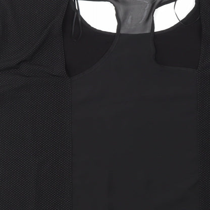 Brand and care label for Atmosphere women’s black polka dot basic blouse, size UK 14