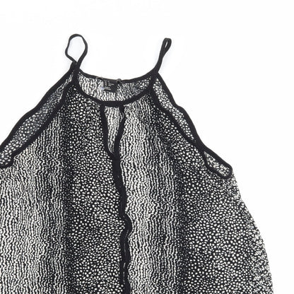 Close-up detail of H&M women’s black polka dot basic tank, size XS