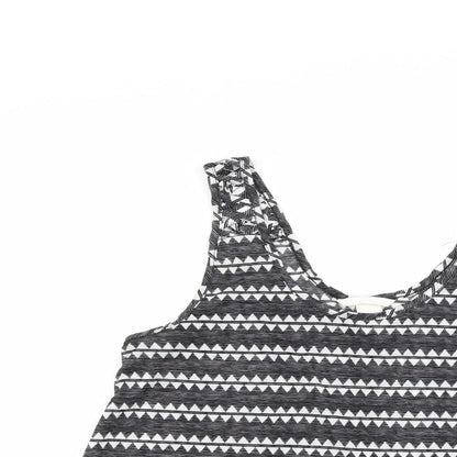 Close-up detail of H&M women’s black geometric basic tank, size M