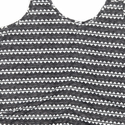 Brand and care label for H&M women’s black geometric basic tank, size M