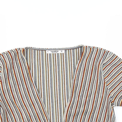 Close-up detail of Pull&Bear women’s multicoloured striped shrug jumper, size S
