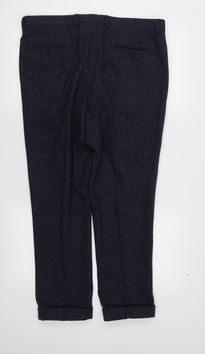 Back view of Matalan men’s blue trousers, size 34, in, 29-inch leg