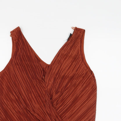 Close-up detail of Preworn women’s orange basic blouse, size UK 8
