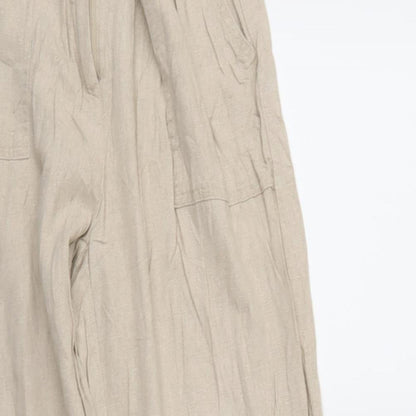 Close-up detail of Diamonds women’s beige trousers, size M, 27.5-inch leg
