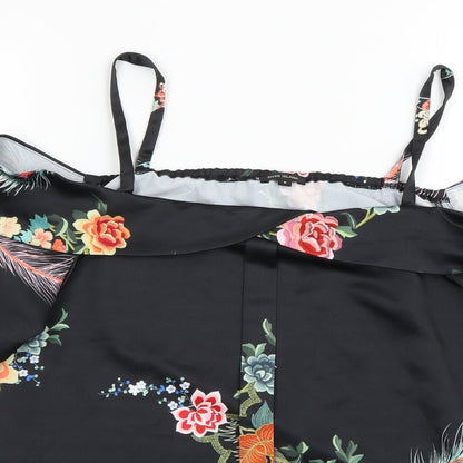 Close-up detail of River Island women’s black floral basic blouse, size UK 8