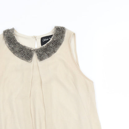 Close-up detail of Autonomy women’s beige basic blouse, size UK 10