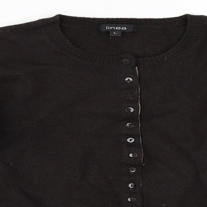 Close-up detail of Linea women’s brown cape jumper, size L