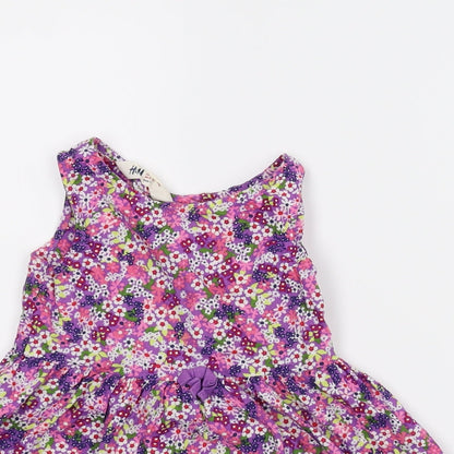Close-up detail of H & M girls’ multicoloured floral a-line, size 2-3, years