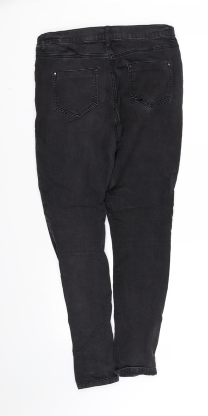 Back view of pre worn women’s black trousers, size UK 10, 32-inch leg