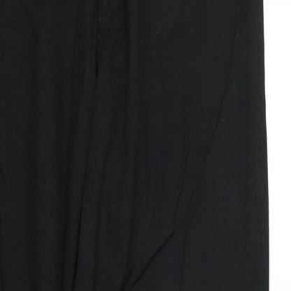 Close-up detail of pre worn women’s black trousers, size L, 37-inch leg