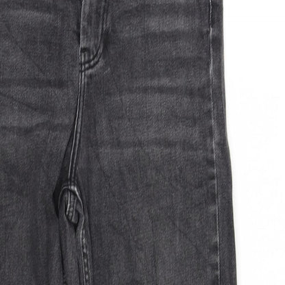 Close-up detail of pre worn women’s black trousers, size UK 34, 29-inch leg