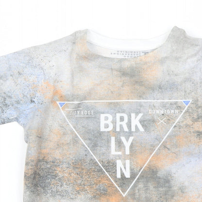 Close-up detail of Tu boys’ grey basic t-shirt, size 8, years
