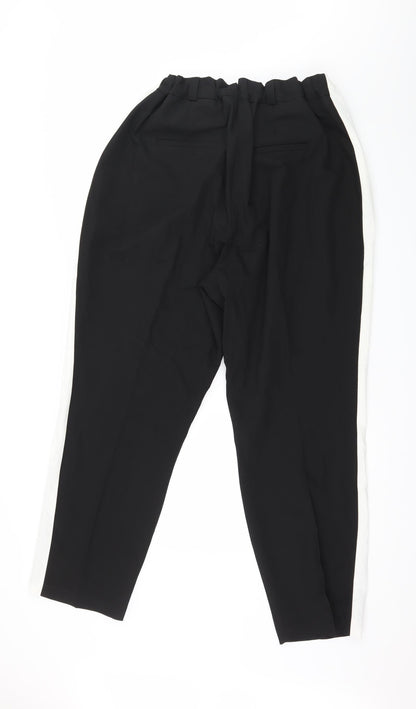 Back view of Edit women’s black striped trousers, size UK 40, in, 30-inch leg