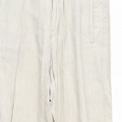 Close-up detail of Next women’s beige trousers, size UK 30, in