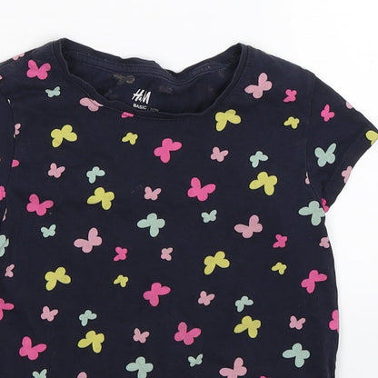 Close-up detail of H&M girls’ blue floral basic t-shirt, size 5-6, years