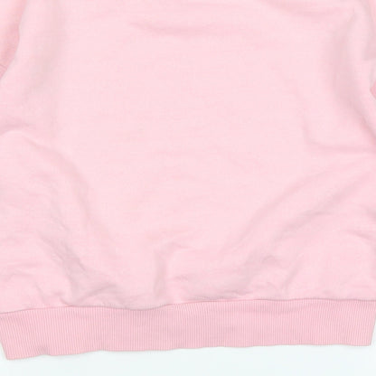 Brand and care label for Active girls’ pink jumper, size 10-11, years