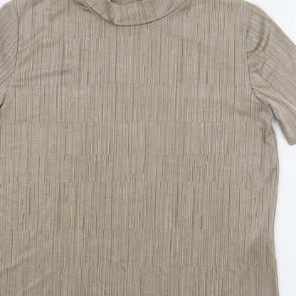 Brand and care label for EWM women’s beige basic blouse, size UK 18